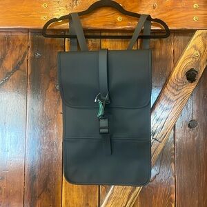 Gorgeous rains black sleek backpack